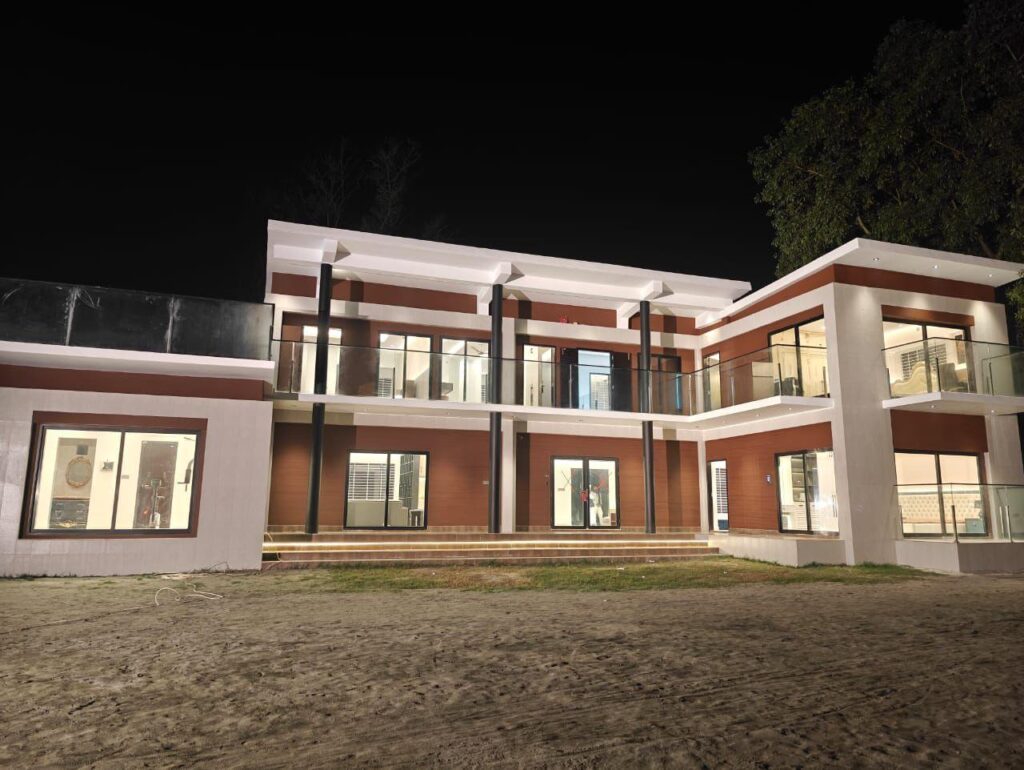 Resort near Dhaka with illuminated exterior and glass balcony
