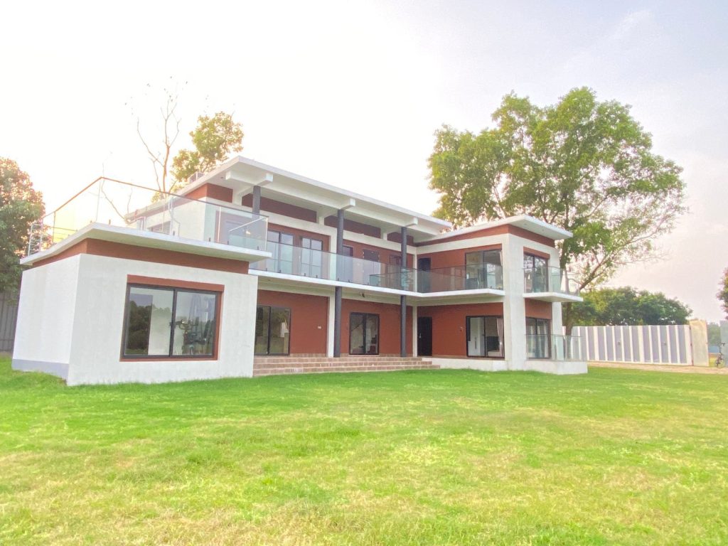 Modern wedding resort in Gazipur with spacious outdoor lawn and luxury villa design near Dhaka