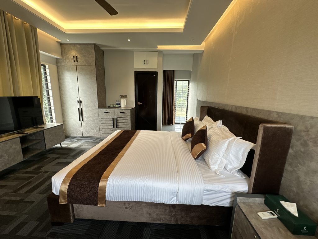 Luxury bedroom interior at River Villa Resort Gazipur with modern decor and comfortable king-size bed
